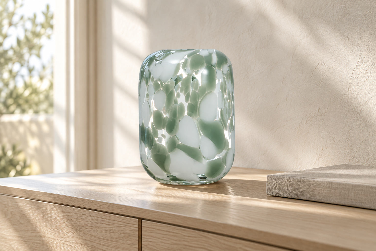 Sage and white Breath of Nature glass vase on pale oak in a quiet interior